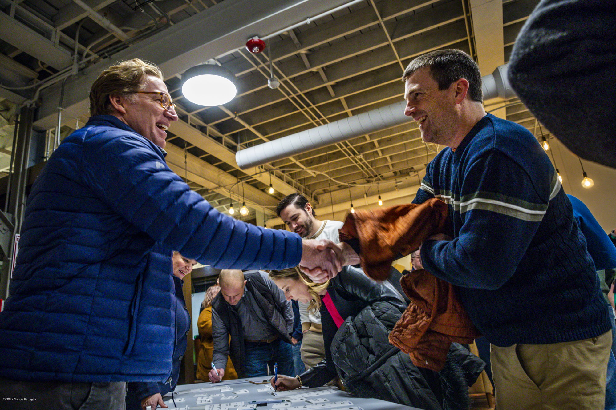 two men shaking hands