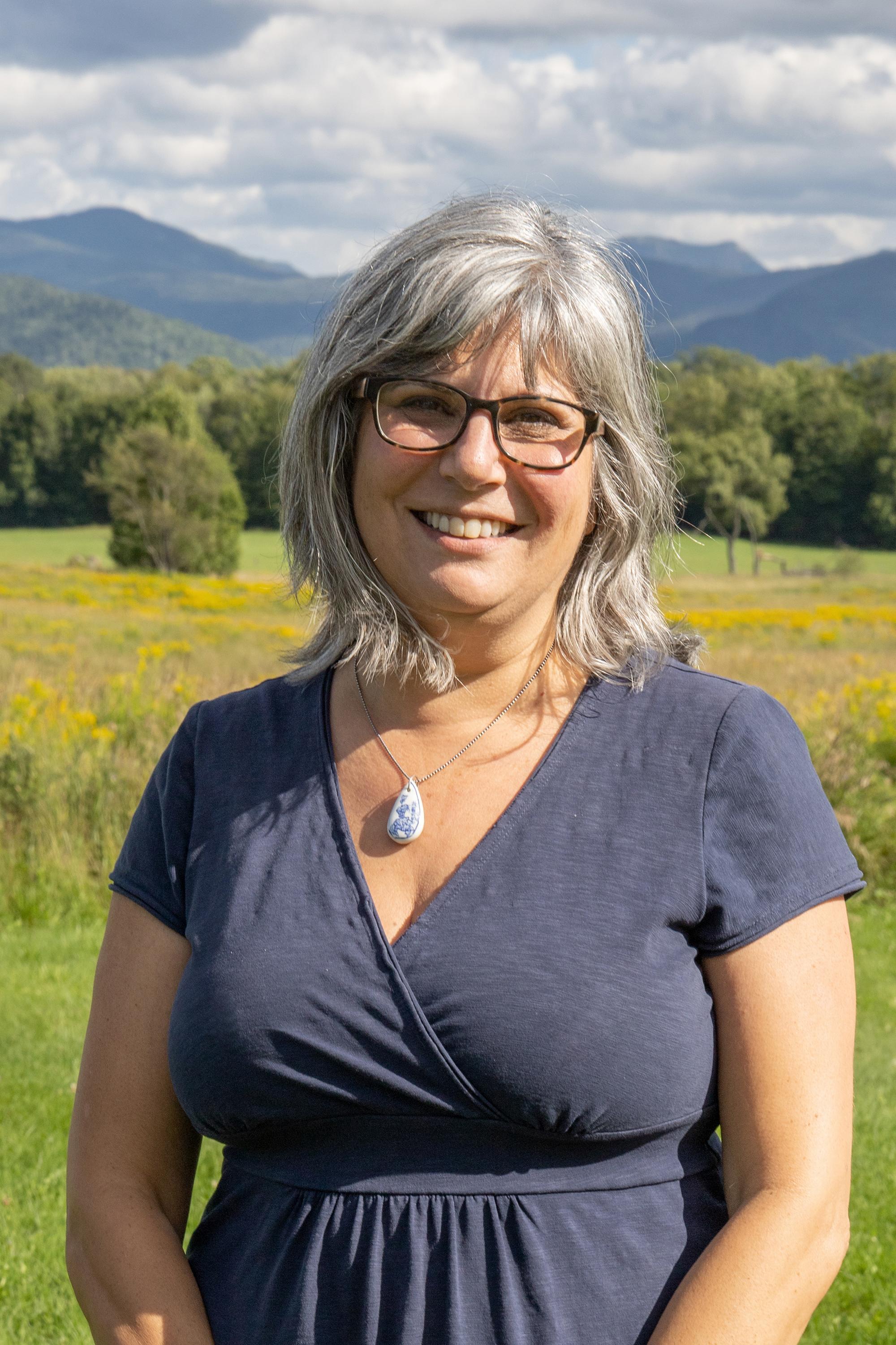 woman in front of mountain view