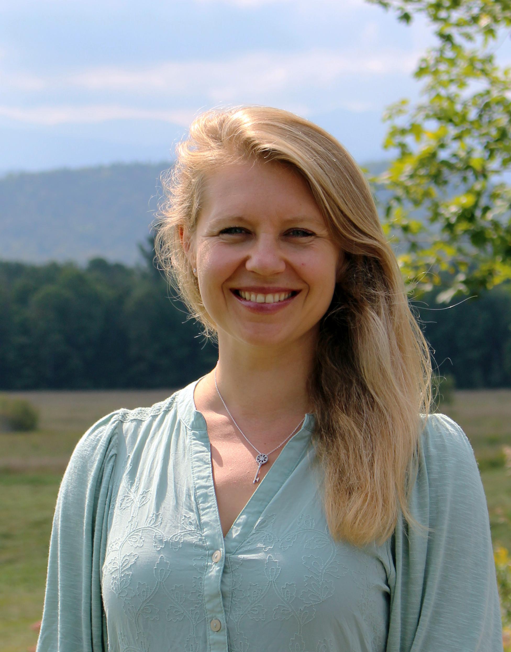 woman in front of mountain view