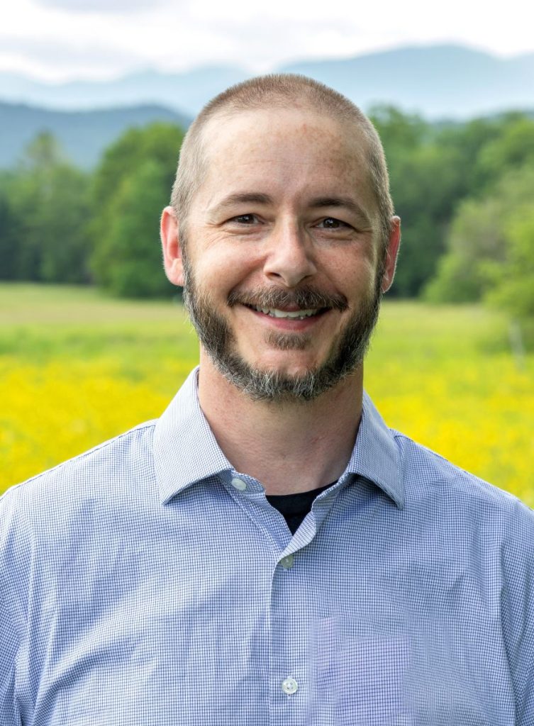 Headshot of man with beard